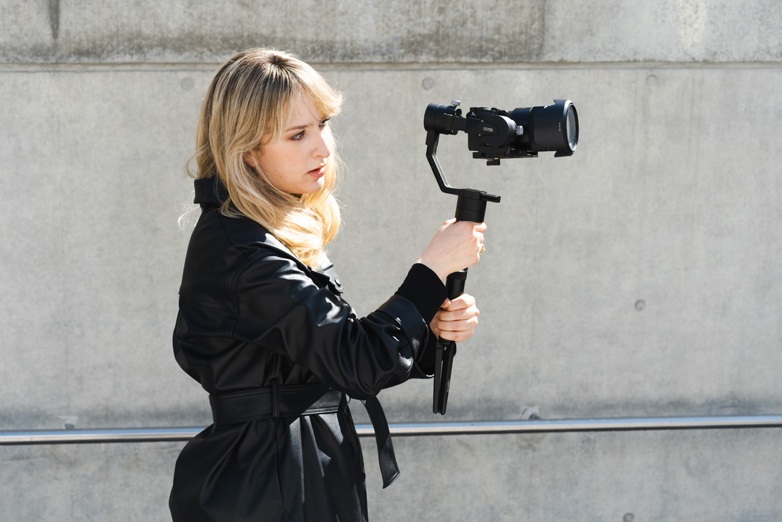 Student Filming a Video Outdoors